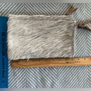 Myra cowhide clutch/wristlet
